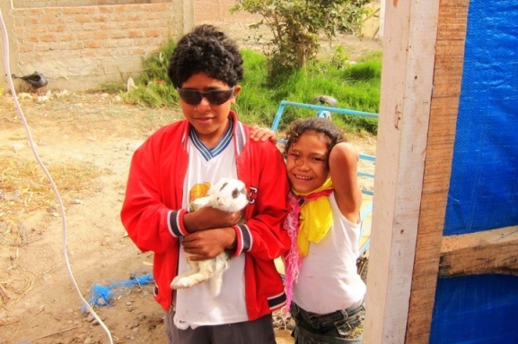 South American kids love to bring small animals as enterainment.